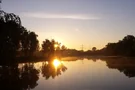 Badesee Heisede Sonne im Wasser gespiegelt